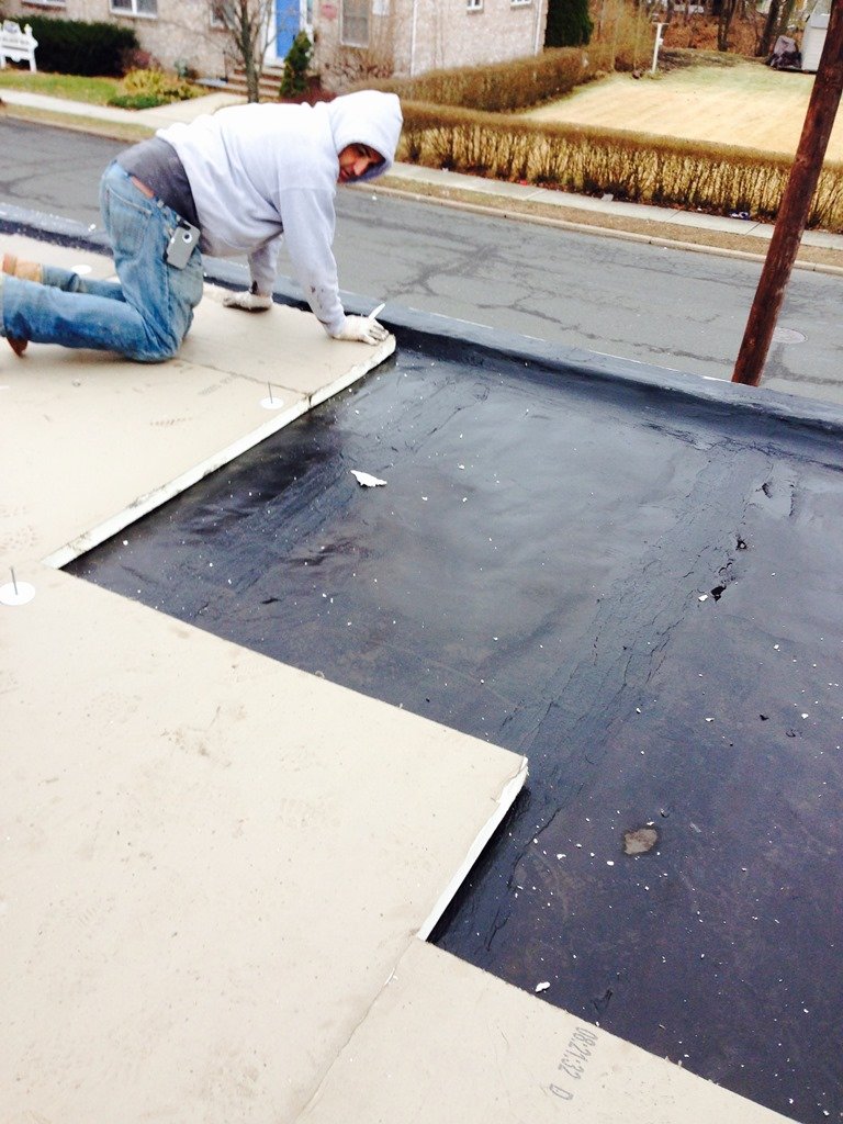 Roofing material being installed on an American Siding project