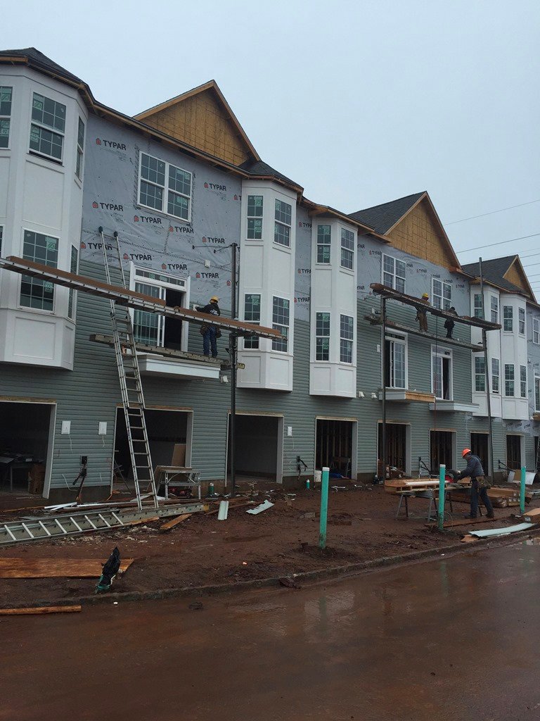 Windows and facade installation on a multifamily building